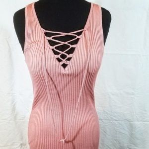 a dusty pink bodycon dress